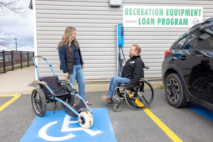 A person who uses a wheelchair is borrowing a Hippocampe from a municipal recreation equipment loan program in Antigonish County.